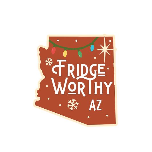 Christmas-themed Fridge Worthy AZ sticker shaped like the state of Arizona, featuring festive string lights, snowflakes, and the North Star, with bold white lettering on a red background.